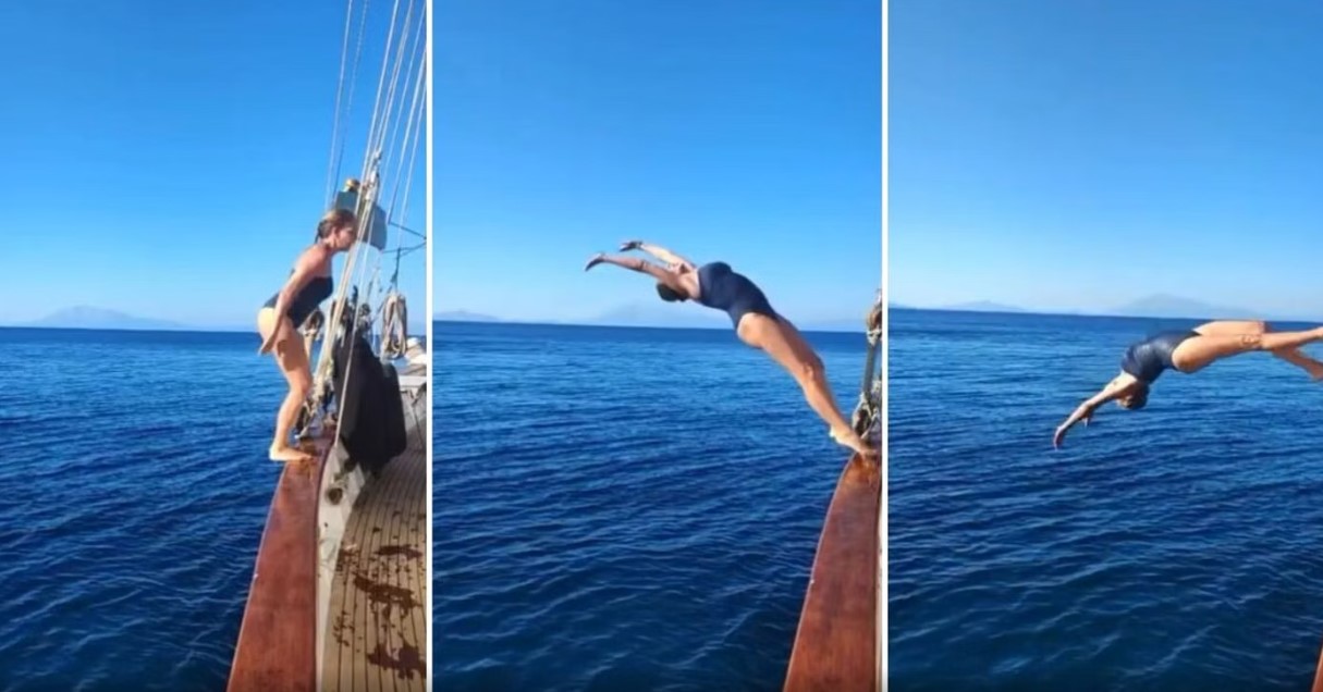 Claudia Gerini, tuffo acrobatico a Patmo e piccolo incidente con il costume