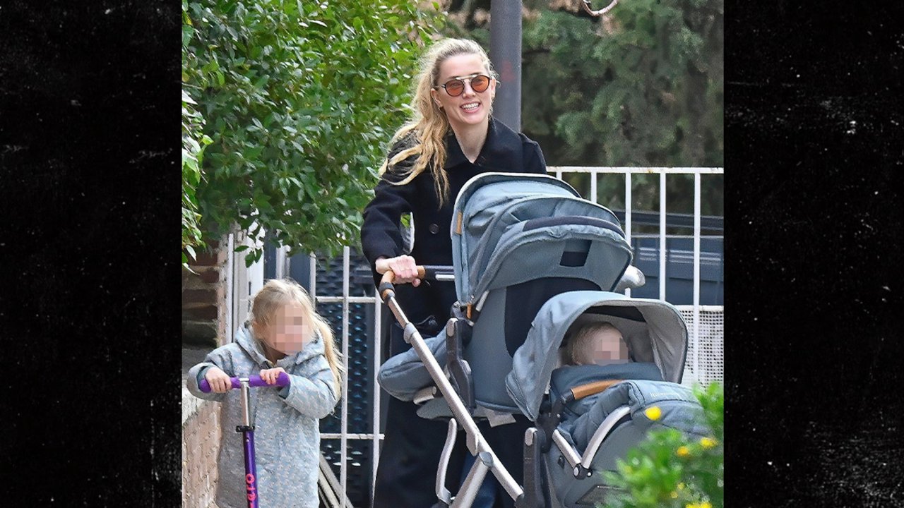 Amber Heard a Madrid con i figli mentre Johnny Depp torna al cinema Amber Heard a Madrid con i figli mentre Johnny Depp torna al cinema